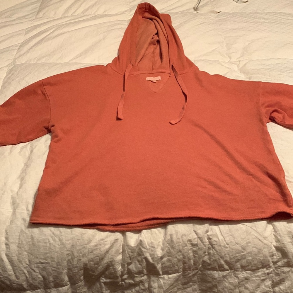 Long sleeve hoodie color is ginger. Retails for $22 size small.